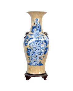 Vase asiatique à décor d'oiseau du paradis bleu et blanc sur fond craquelé jaune