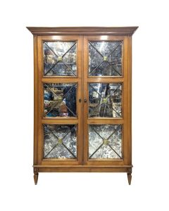 Armoire 1940 à décor de croisillons en bronze  et vitre églomisée