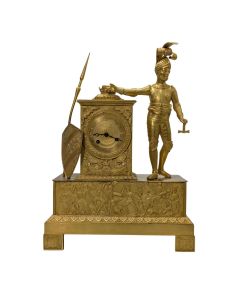 Pendule au chevalier d'époque empire en bronze doré 